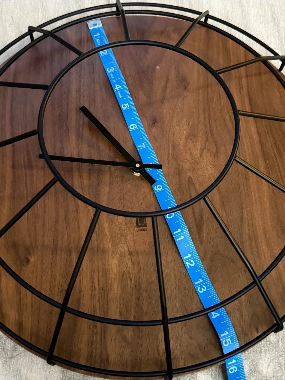 Umbra Black metal and solid wood Modern Wall Clock